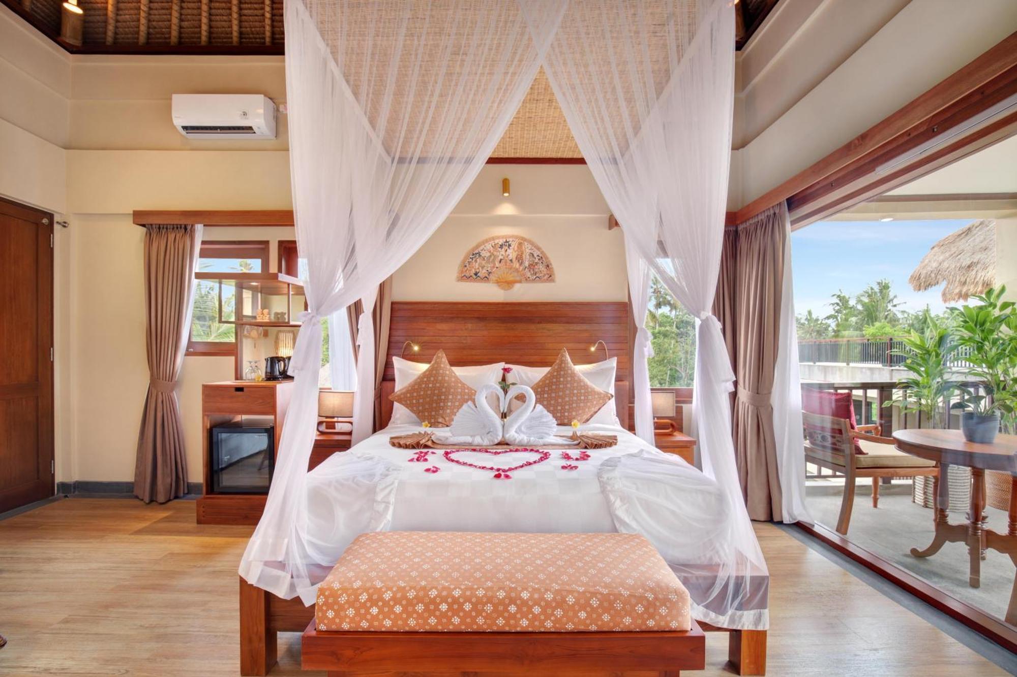 Ubud Nyuh Bali Resort & Spa Δωμάτιο φωτογραφία A bedroom at the resort